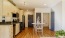 a kitchen with wooden floors